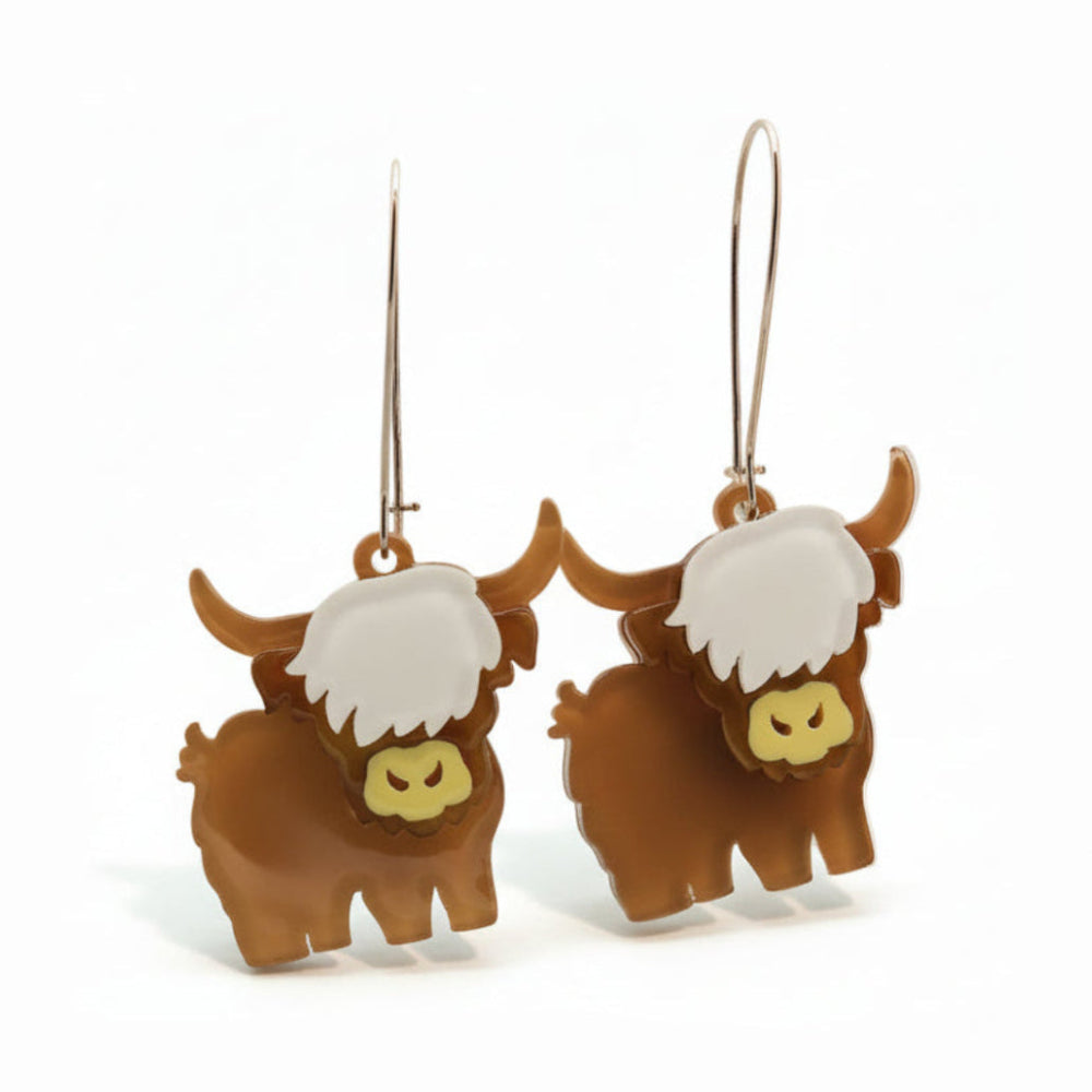 Pendientes de vaca de las tierras altas en capas